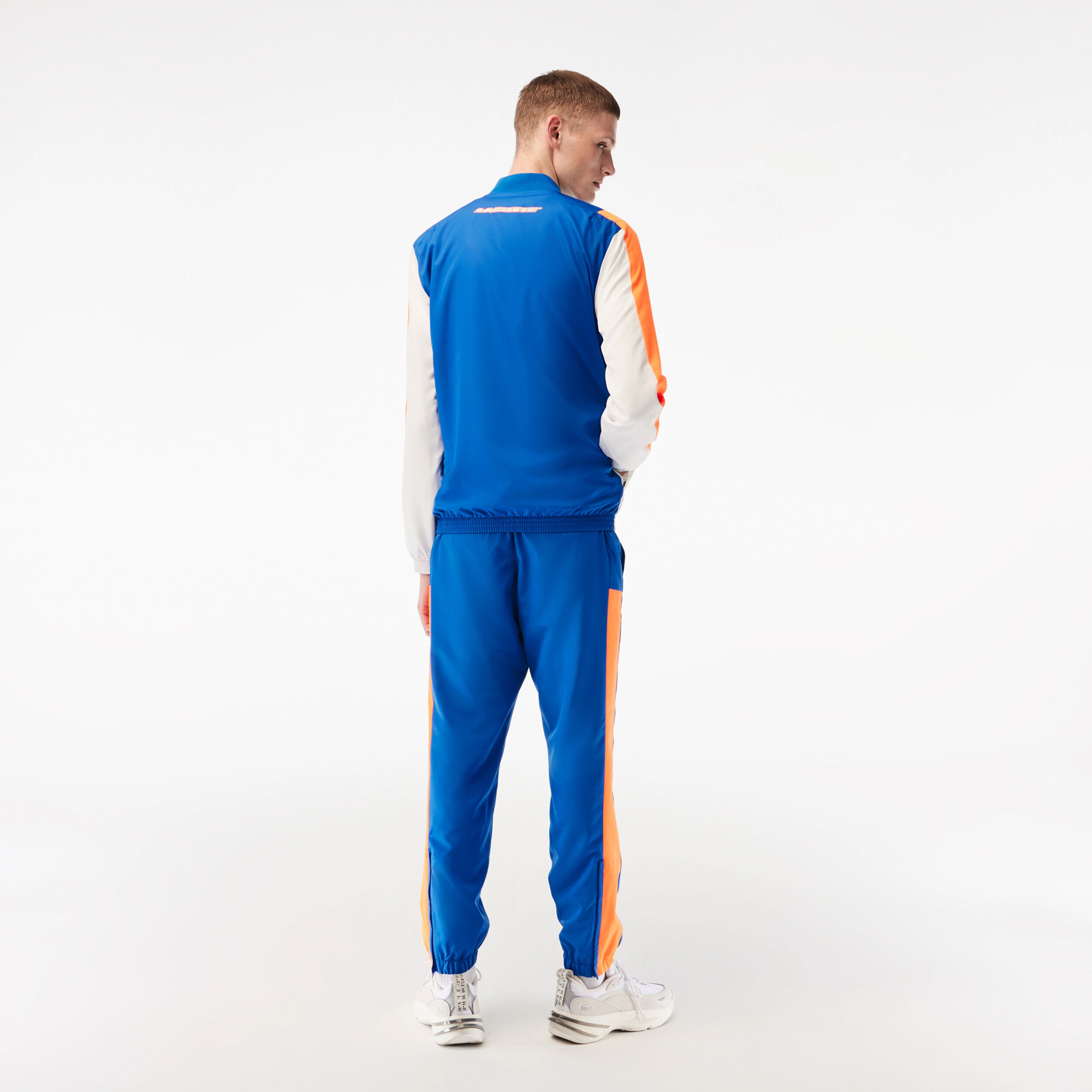 Buy Lacoste Trainingspak Heren Blauw Oranje online Tennis Point NL